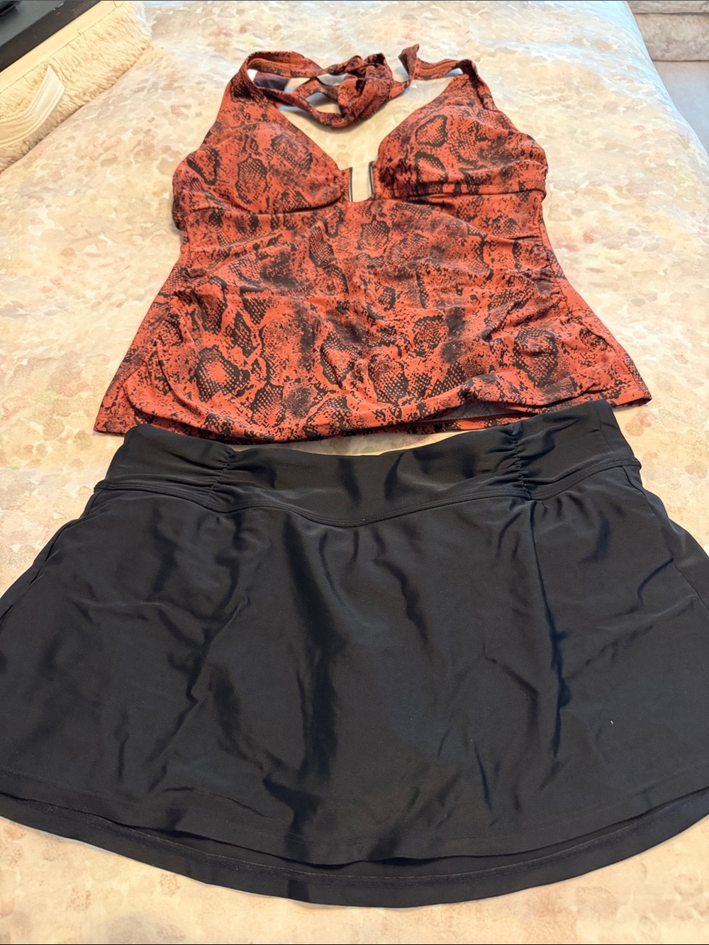 Black Athleta swim skirt with Rust Snake-Print Halter swim top